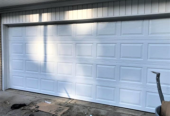 Insulated White Sectional Garage Door Repair Blaine, MN